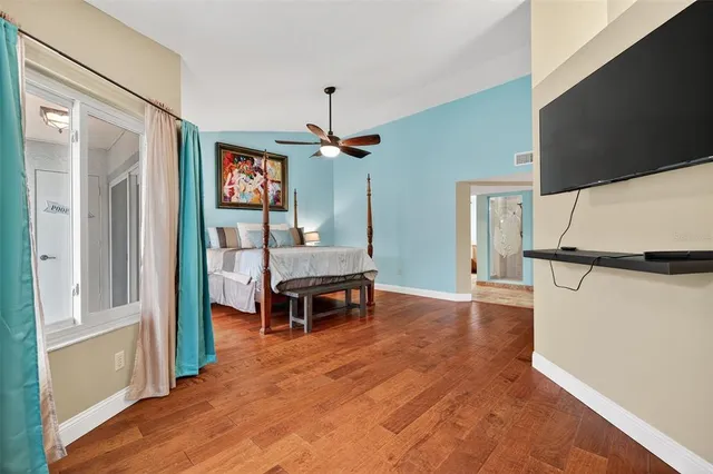 a kitchen with stainless steel appliances granite countertop a stove refrigerator and a sink