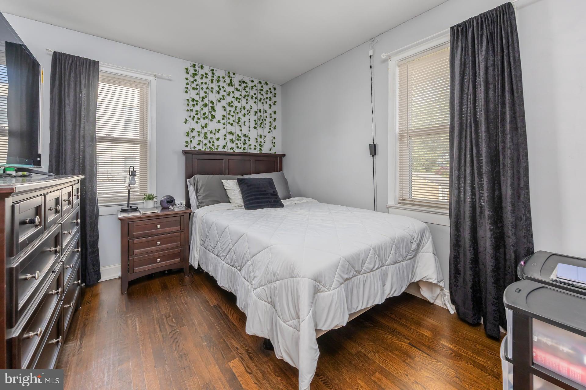 229 Filmore Street Riverside, NJ 08075 - Photo 12 of 18 a bed room with a bed and a tv