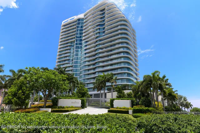 a front view of a building with garden