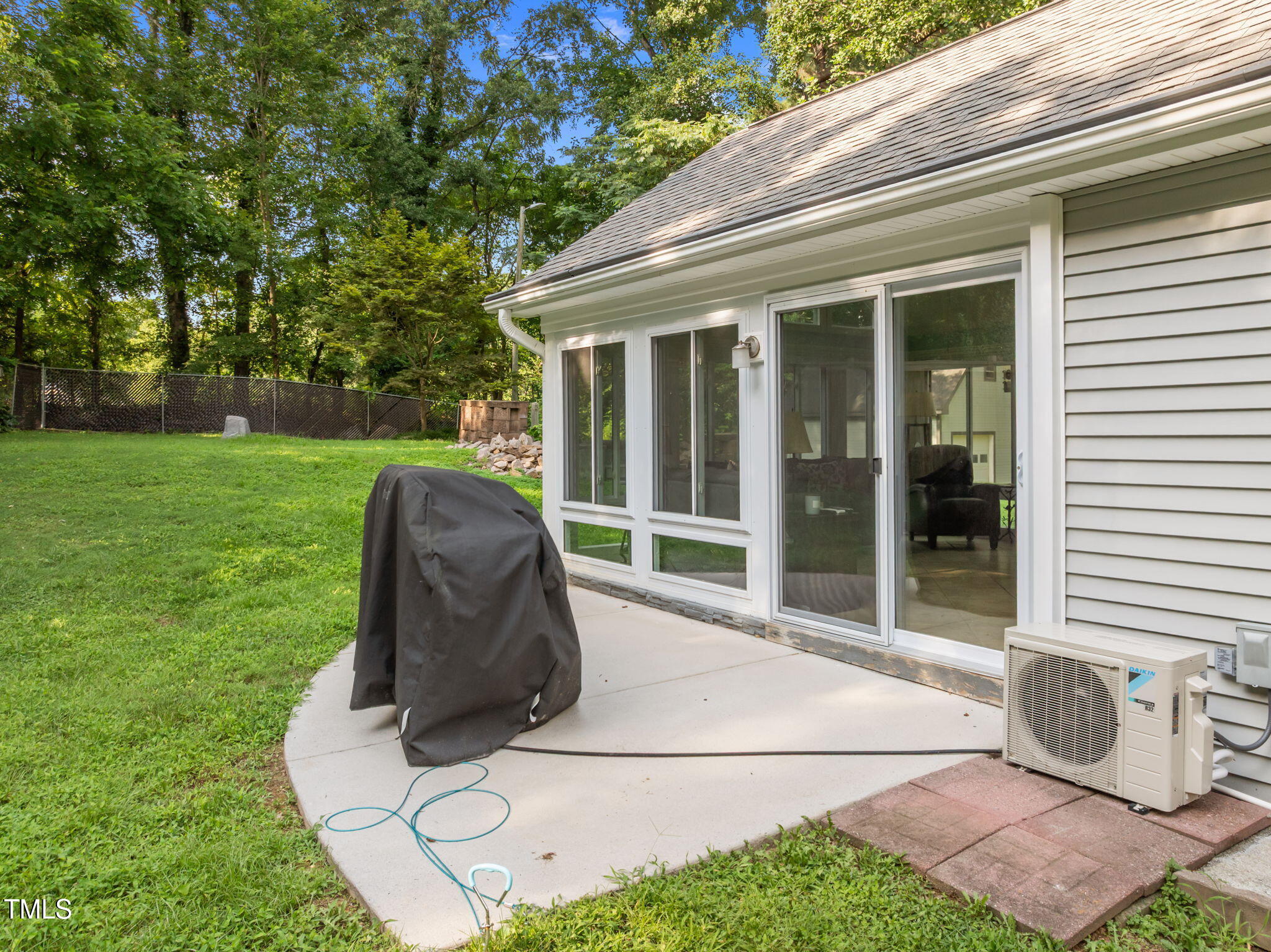 219 Barclay Road Durham, NC 27712 - Photo 21 of 36 a view of a patio with table and chairs and potted plants