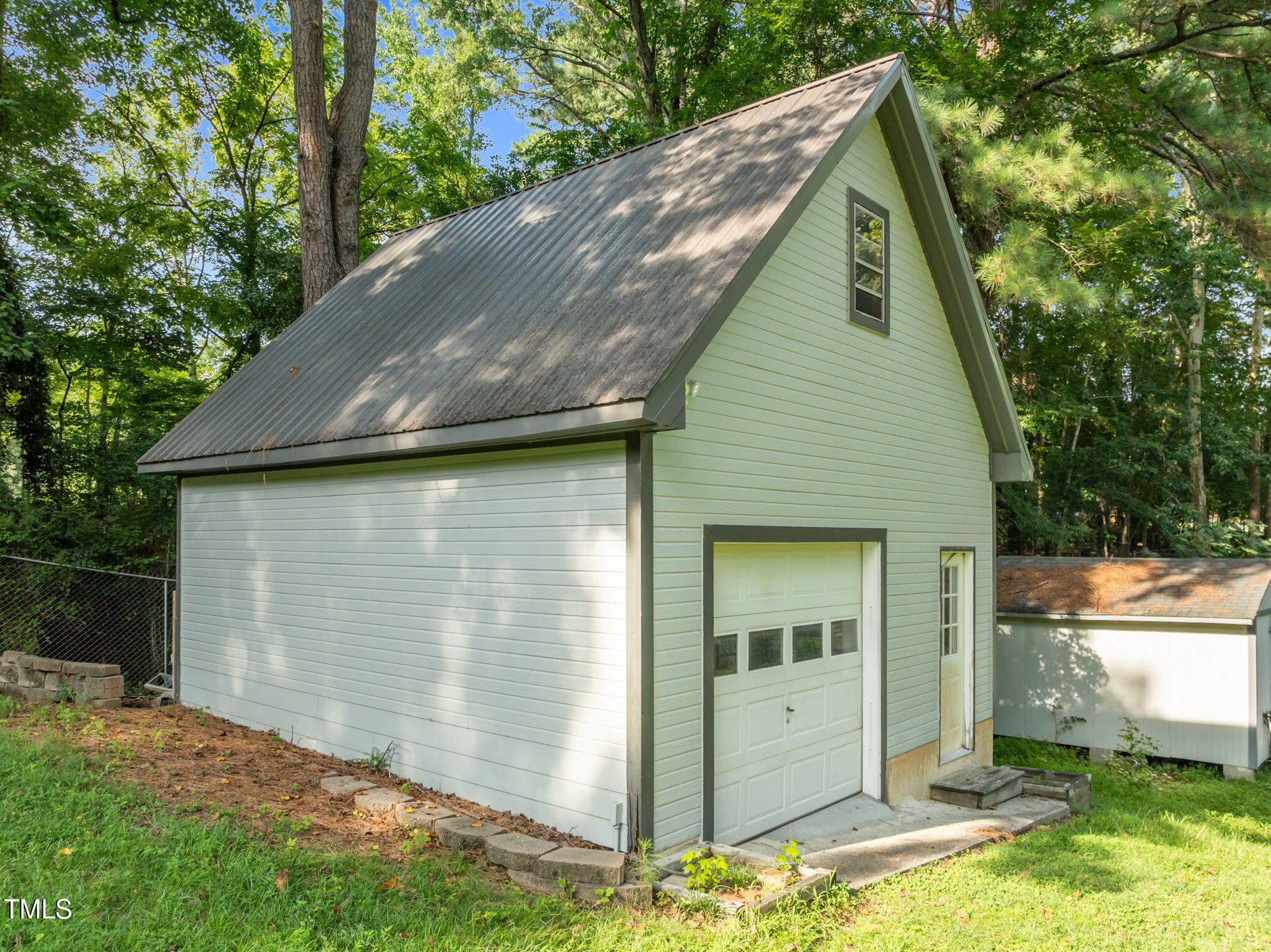 219 Barclay Road Durham, NC 27712 - Photo 23 of 36 a view of backyard of house with green space