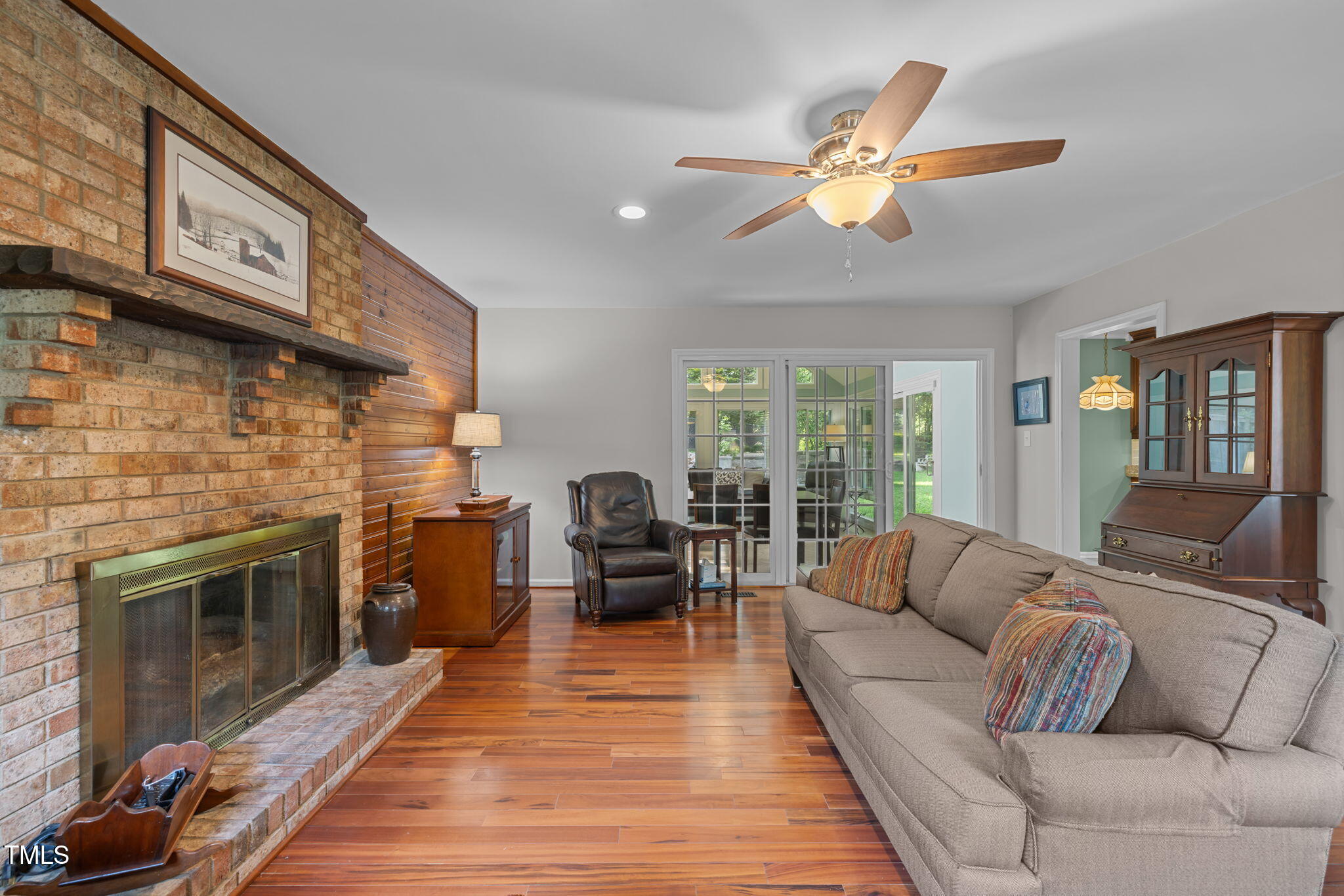 219 Barclay Road Durham, NC 27712 - Photo 4 of 36 a living room with furniture and a fireplace