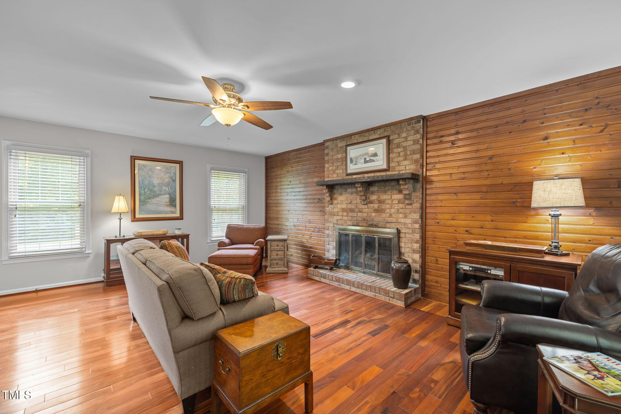 219 Barclay Road Durham, NC 27712 - Photo 6 of 36 a living room with furniture and a fireplace