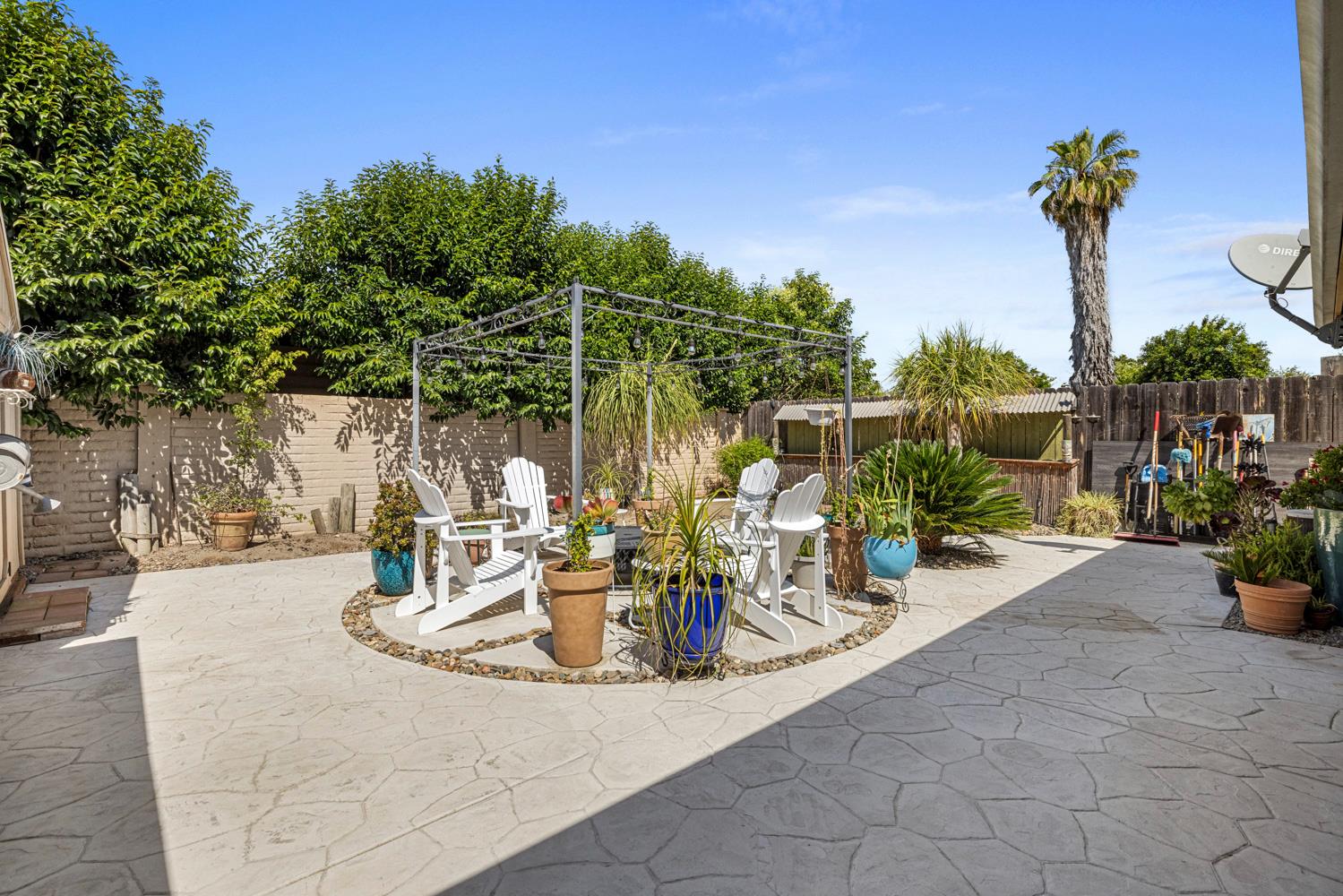 1121 Raymond Drive Modesto, CA 95351 - Photo 39 of 44 a view of a swimming pool with a patio
