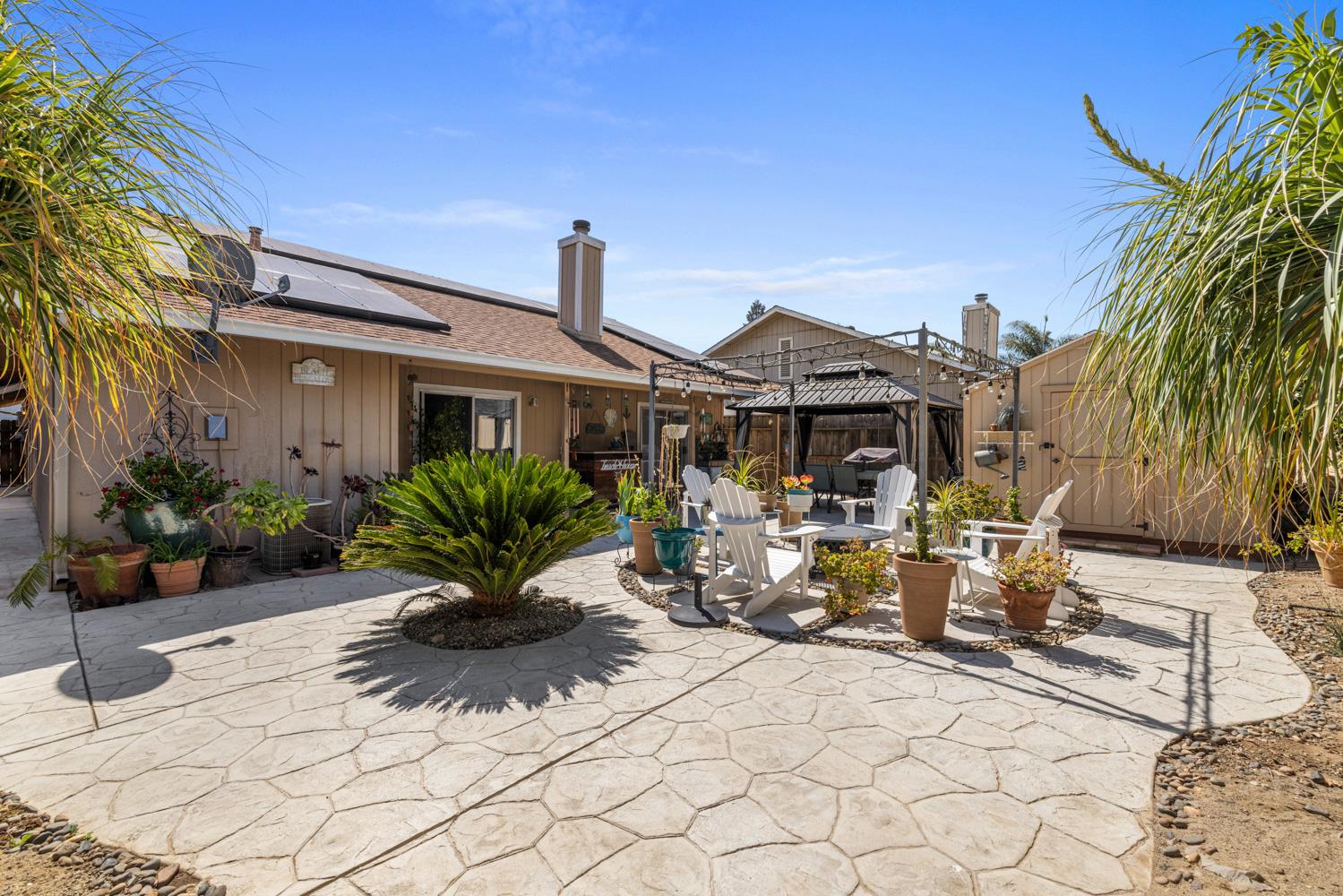 1121 Raymond Drive Modesto, CA 95351 - Photo 40 of 44 a view of a house with backyard and sitting area