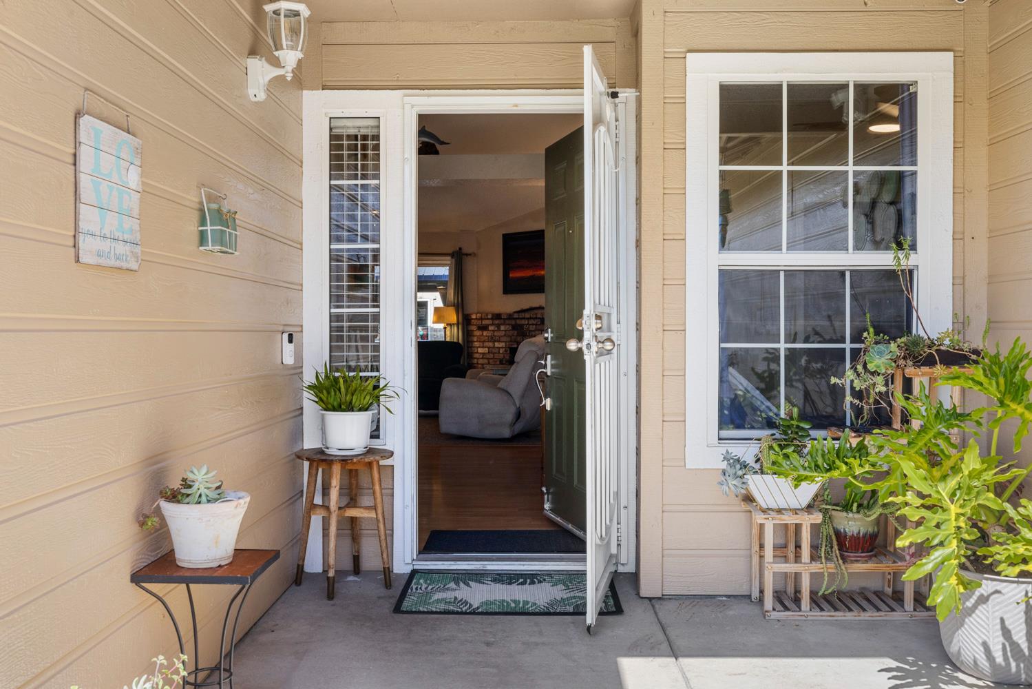 1121 Raymond Drive Modesto, CA 95351 - Photo 6 of 44 a view of a entryway door front of house
