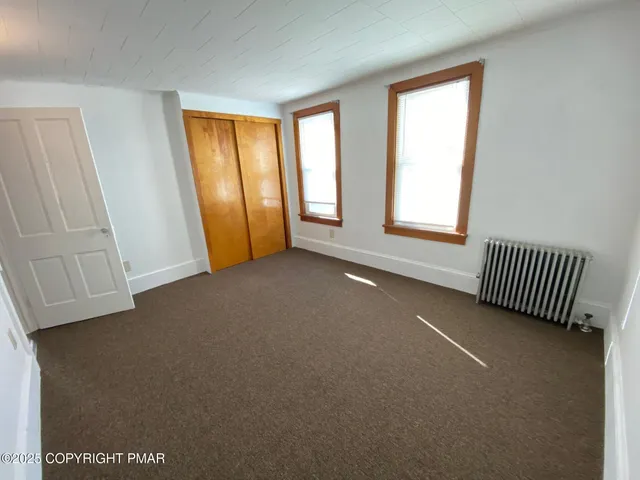 a view of a storage & utility room with washer and dryer
