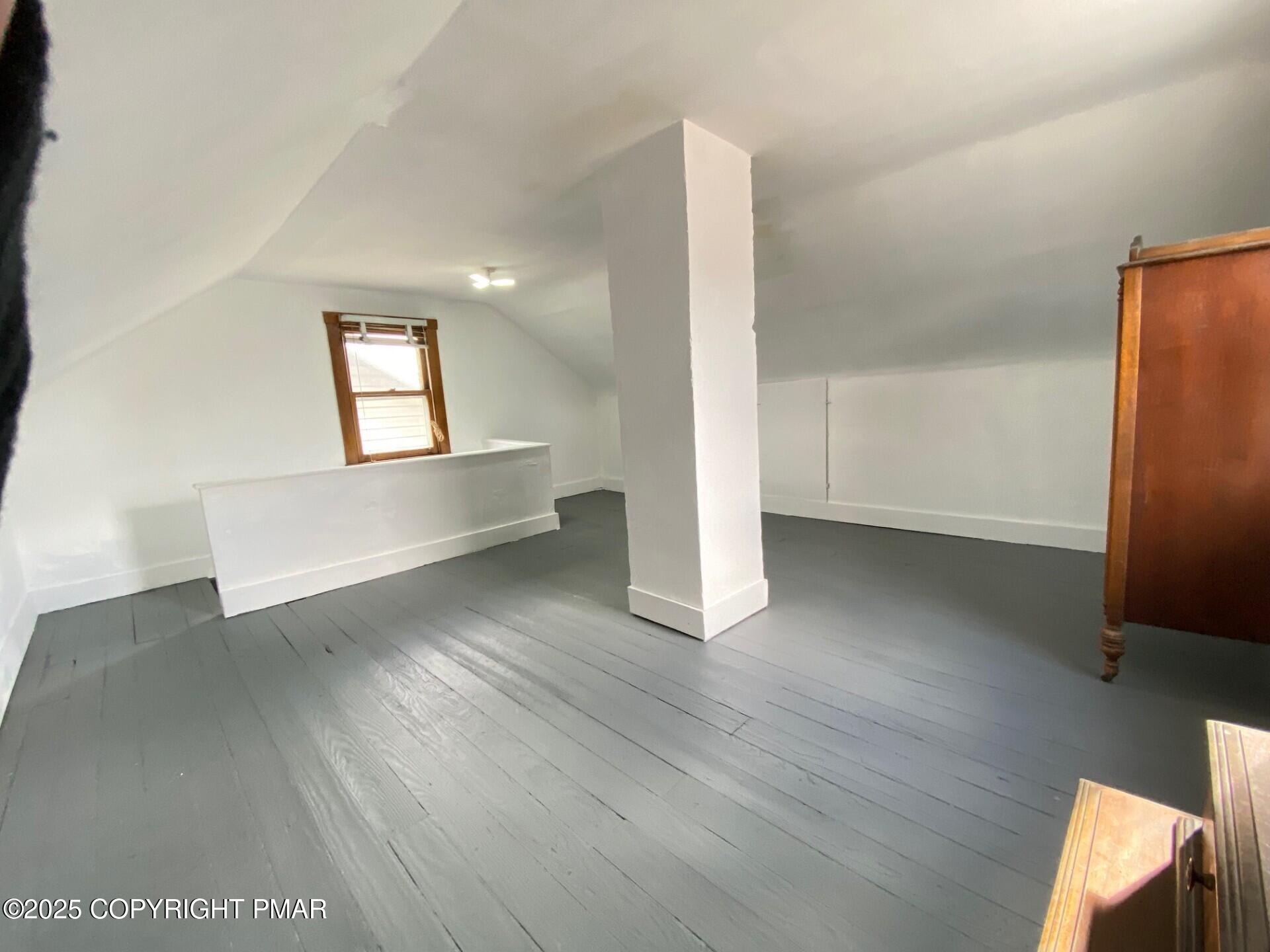 36 East Fell Street Summit Hill, PA 18250 - Photo 24 of 44 a view of an empty room with wooden floor and a window