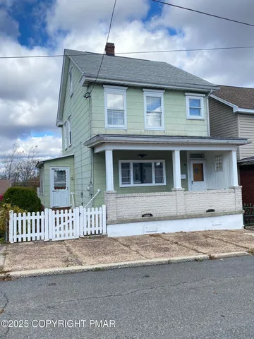 a view of a living room and a window