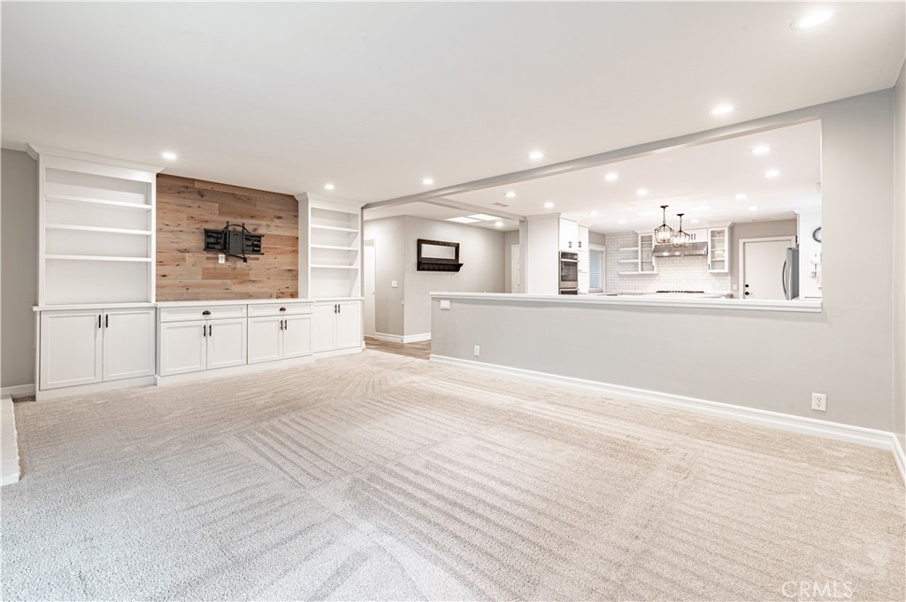 4580 Hazelnut Avenue Seal Beach, CA 90740 - Photo 18 of 34 an empty room with a kitchen and sink