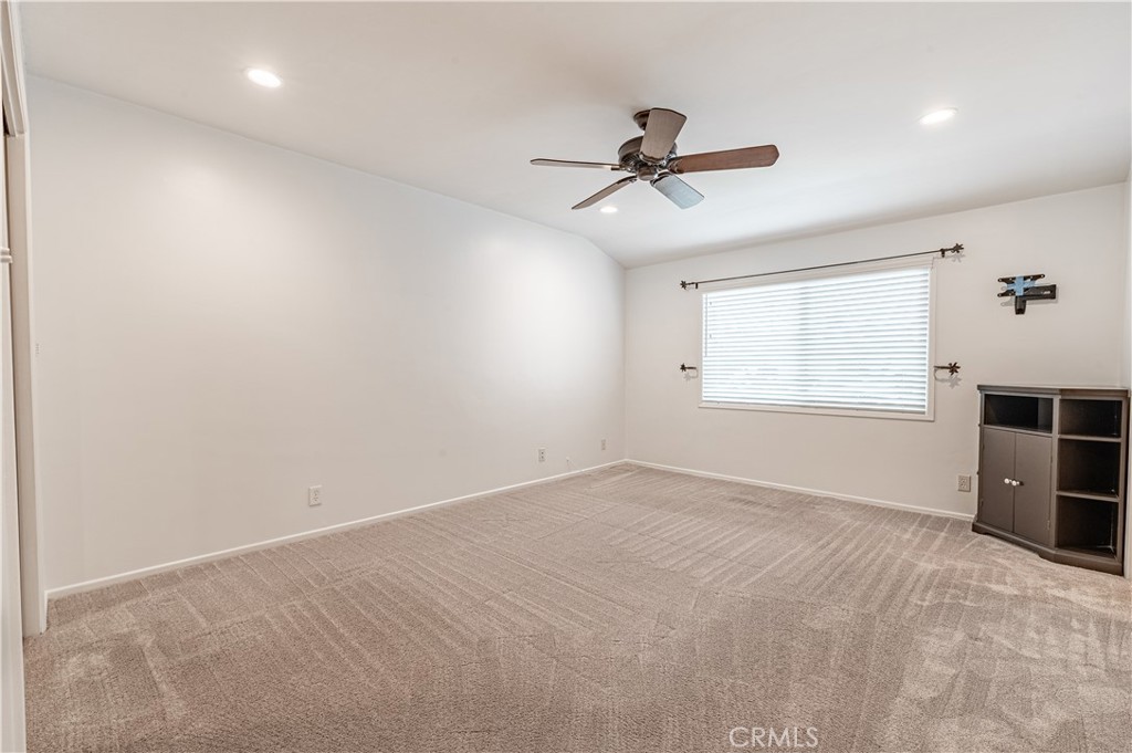 4580 Hazelnut Avenue Seal Beach, CA 90740 - Photo 20 of 34 a view of an empty room with a window