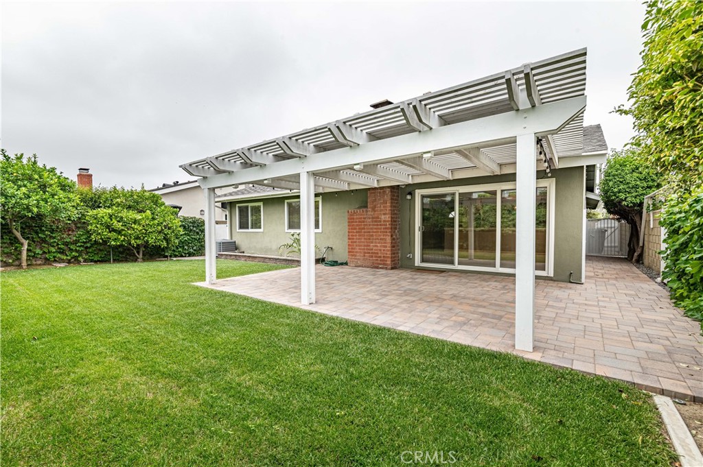 4580 Hazelnut Avenue Seal Beach, CA 90740 - Photo 32 of 34 front view of a house with a yard