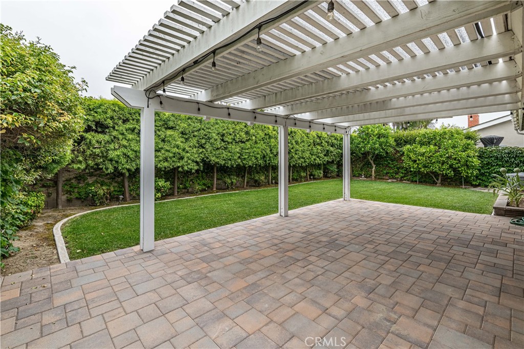 4580 Hazelnut Avenue Seal Beach, CA 90740 - Photo 33 of 34 a view of a house with backyard and porch