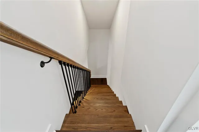 a view of kitchen island with wooden floor