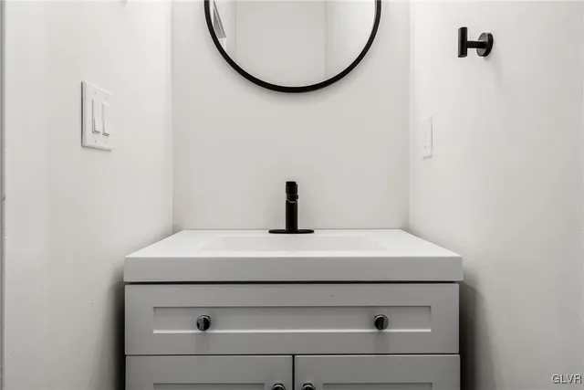 a kitchen with stainless steel appliances a refrigerator and a stove top oven