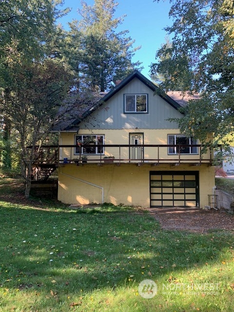 7634 Zell Road Custer, WA 98240 - Photo 1 of 38 a front view of a house with garden