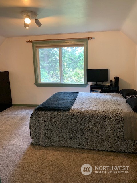 7634 Zell Road Custer, WA 98240 - Photo 17 of 38 a bedroom with a bed and window