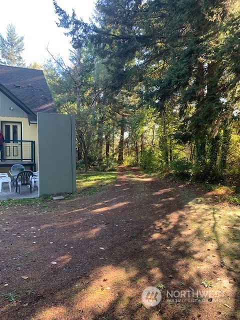 7634 Zell Road Custer, WA 98240 - Photo 23 of 38 a view of a yard with plants and large trees
