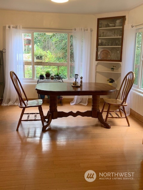 7634 Zell Road Custer, WA 98240 - Photo 4 of 38 a view of a workspace with furniture and a window