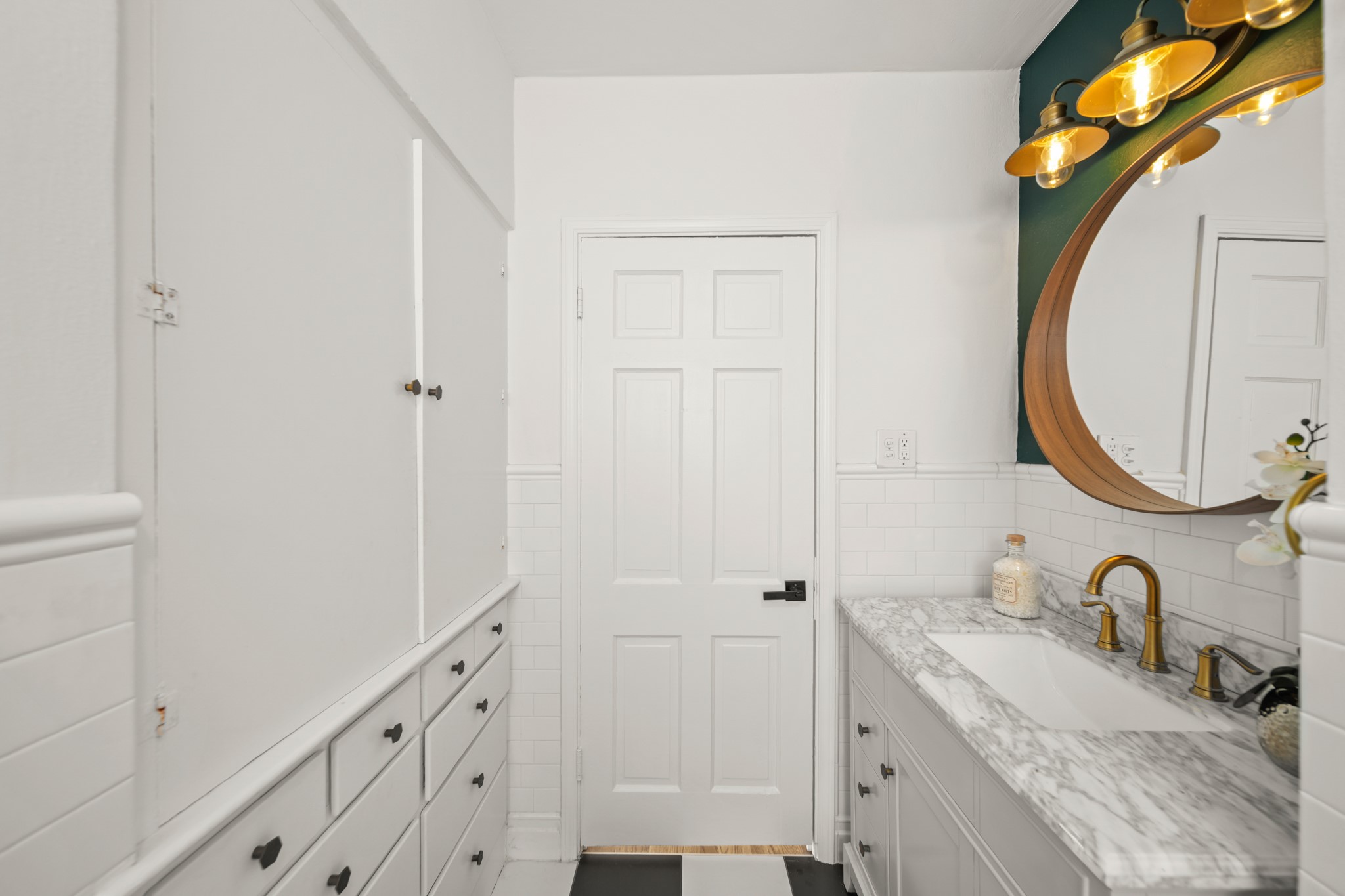4391 Varsity Lane Houston, TX 77004 - Photo 23 of 45 a bathroom with a granite countertop sink and a mirror