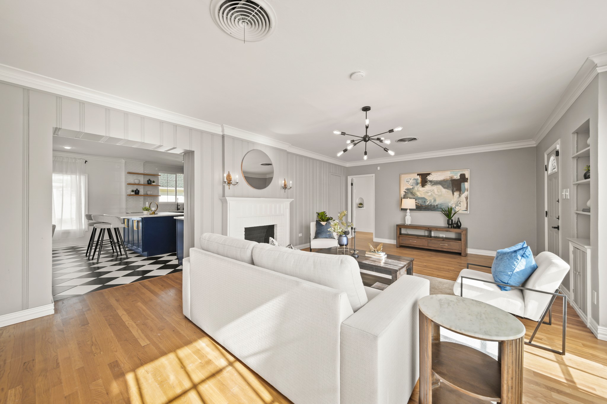 4391 Varsity Lane Houston, TX 77004 - Photo 10 of 45 a living room with furniture and a chandelier