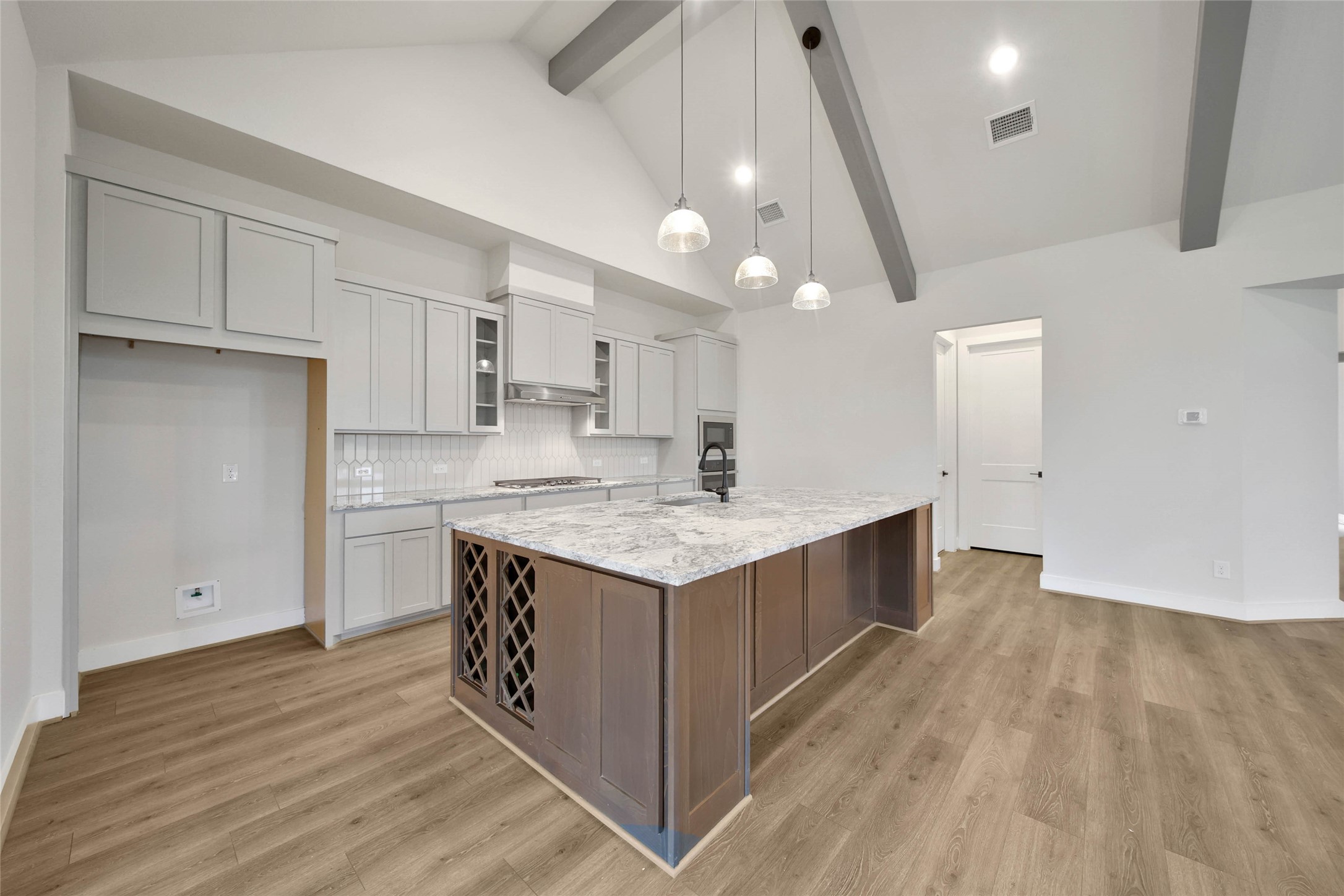 4610 Magnolia Bend Drive Rosharon, TX 77583 - Photo 11 of 48 a kitchen with a stove and a sink