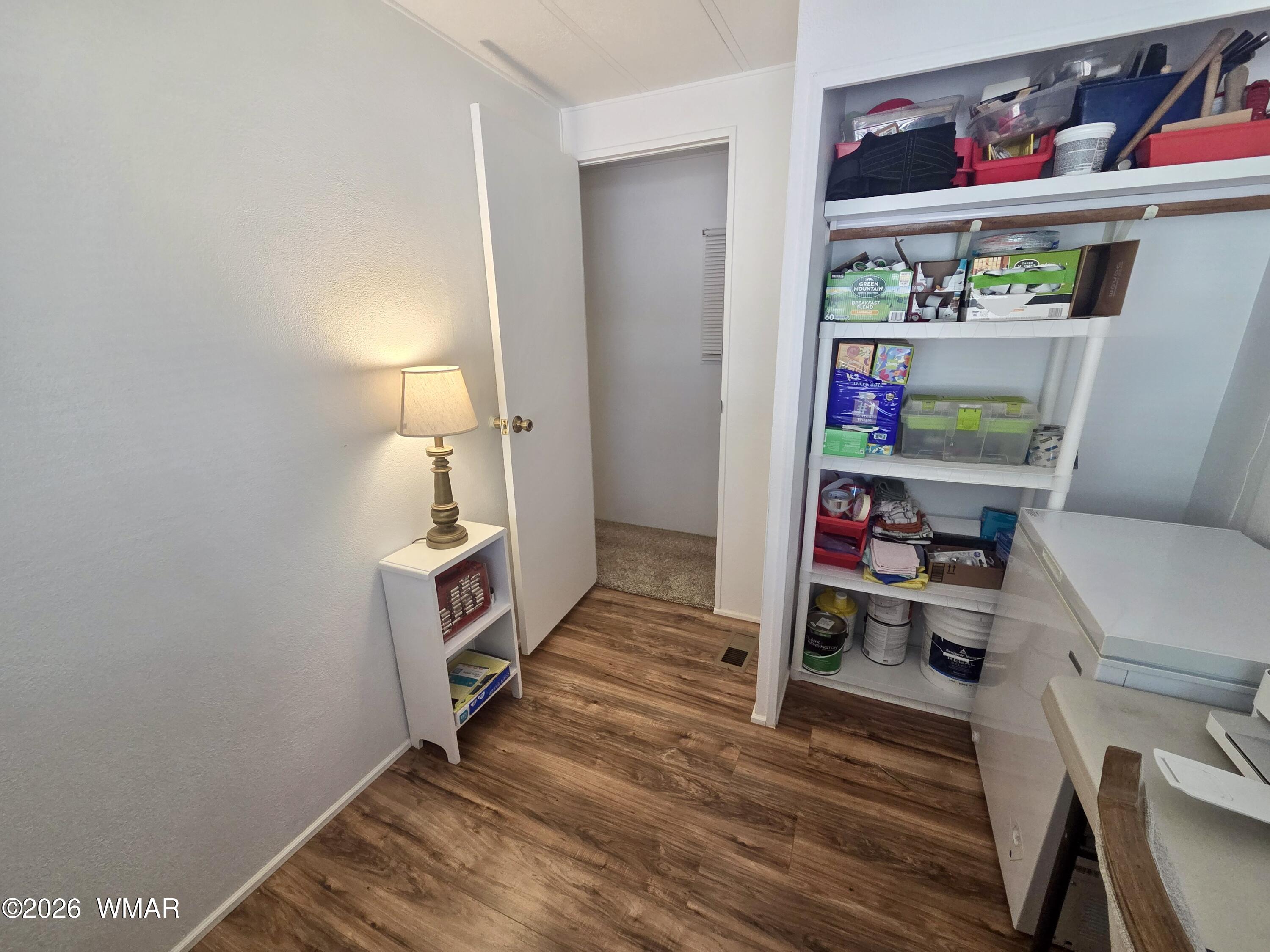 727 South Butler Street Eagar, AZ 85925 - Photo 24 of 32 a room with furniture and a wooden floor