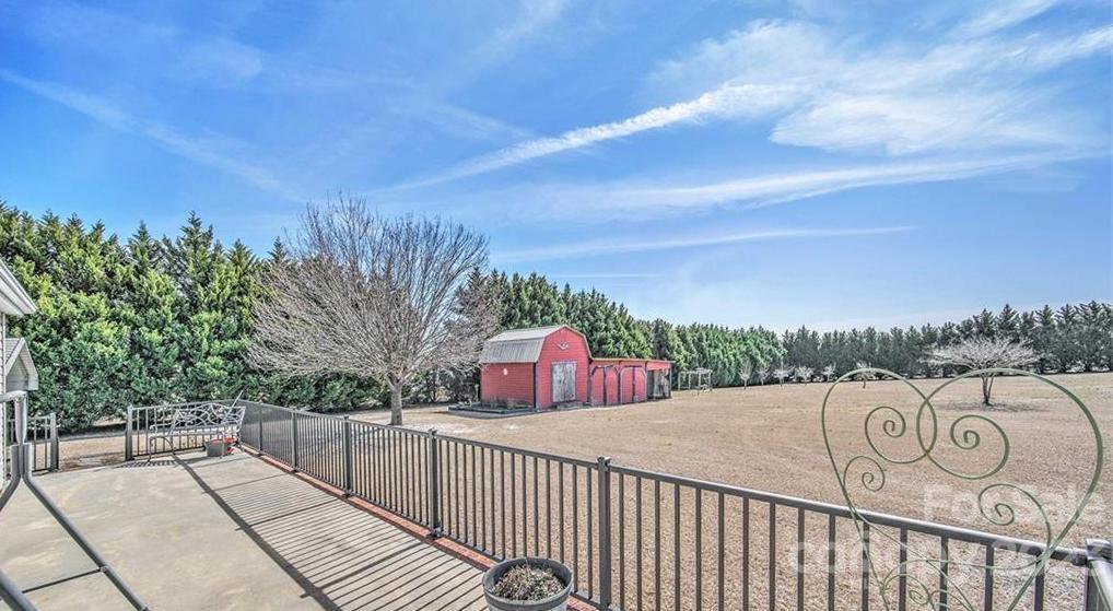 713 Bailey Sawmill Road Ruby, SC 29741 - Photo 23 of 30 a view of a street with a wrought fence