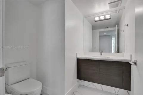a bathroom with a sink and a toilet