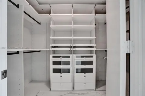 a view of a room with shelves