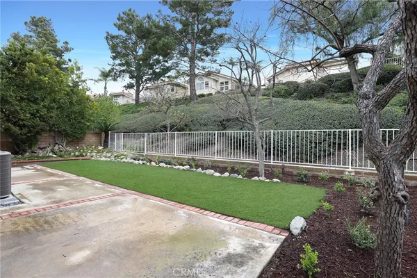 a view of a backyard with a garden
