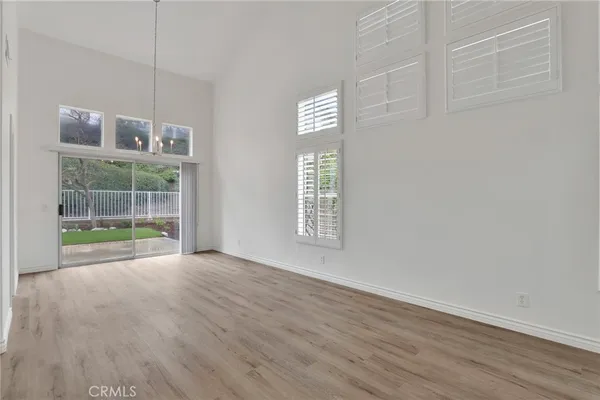 a kitchen with white cabinets