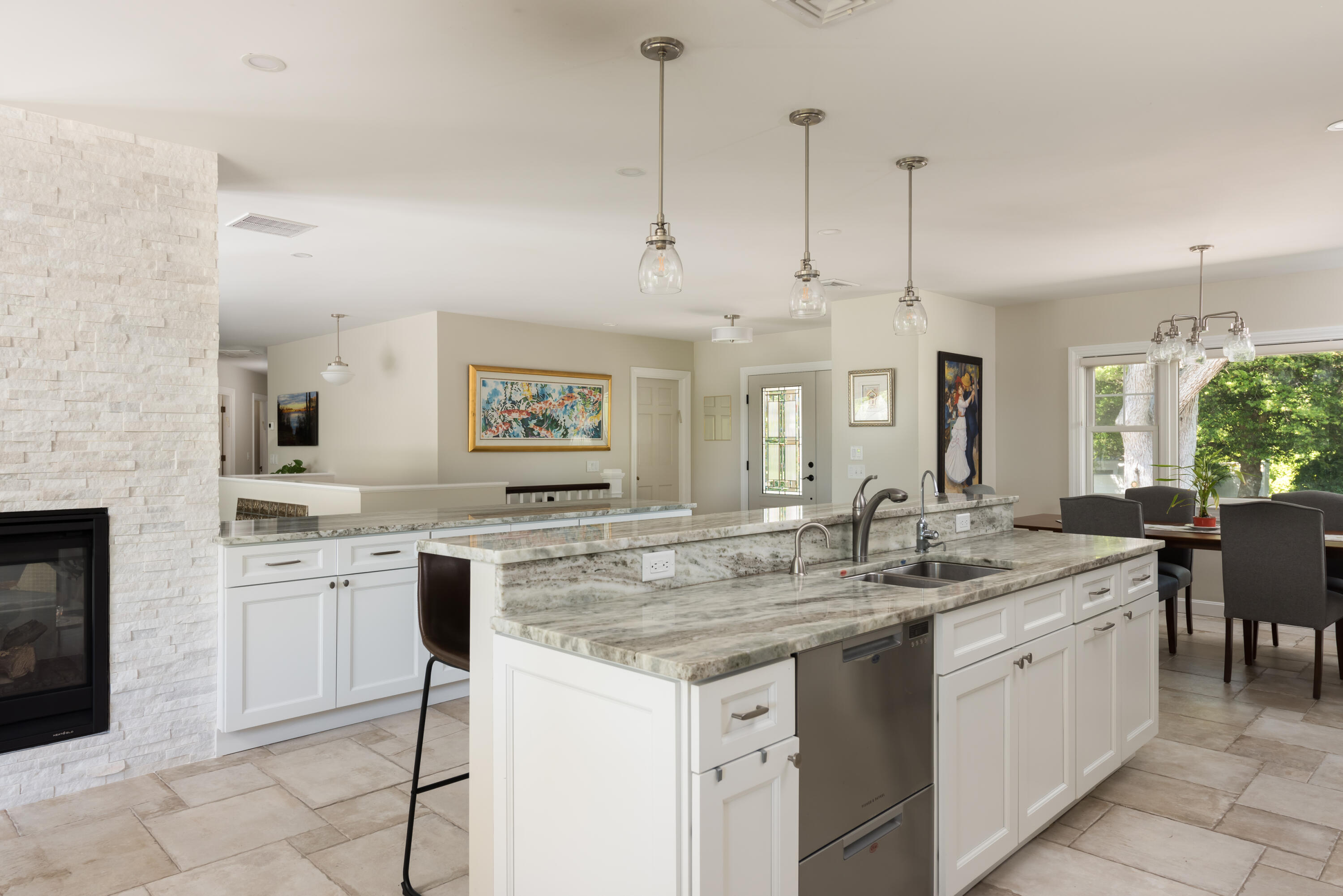 180 Riverview Lane Centerville, MA 02632 - Photo 14 of 55 a kitchen with a sink stove and cabinets