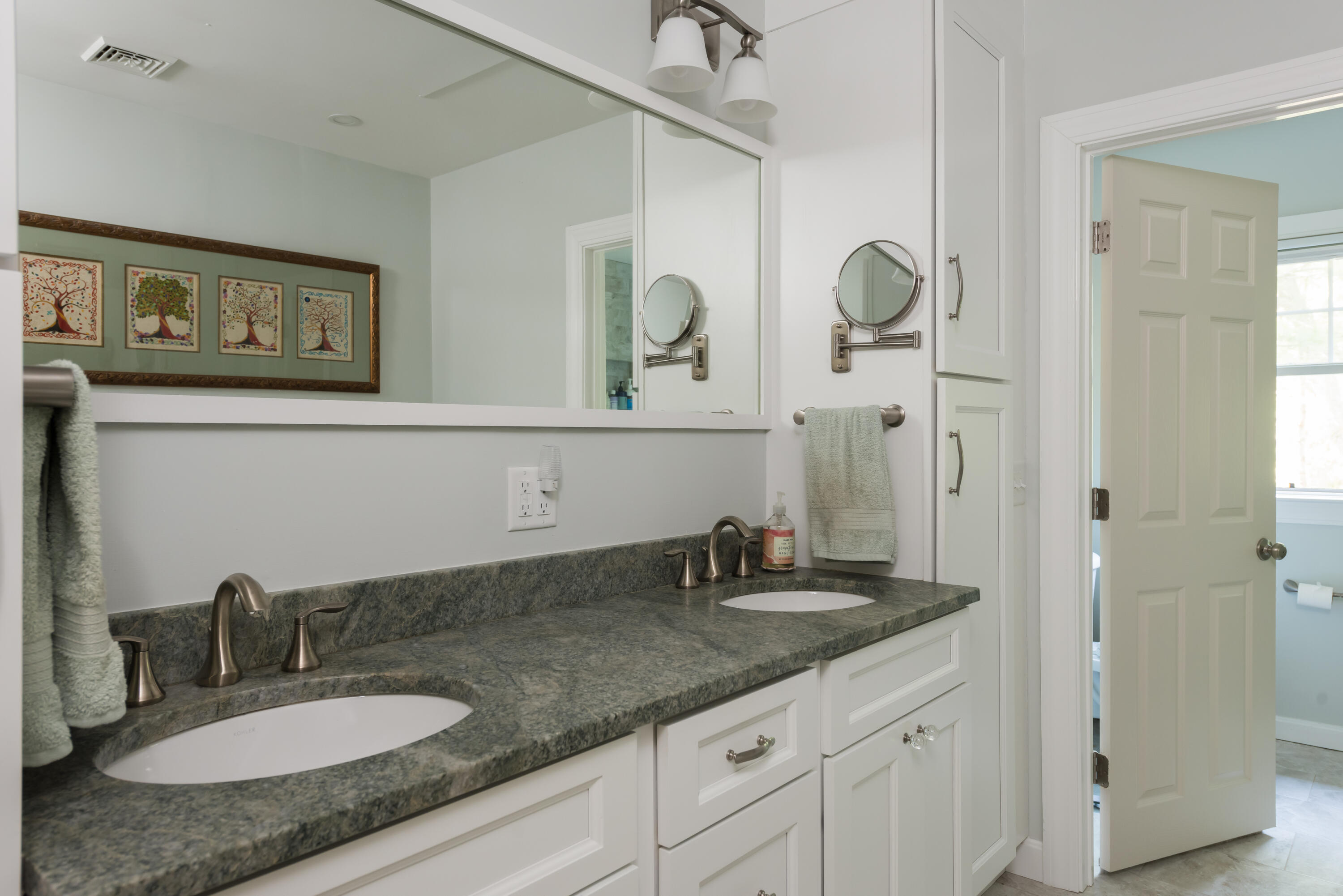 180 Riverview Lane Centerville, MA 02632 - Photo 23 of 55 a bathroom with a granite countertop sink and a mirror