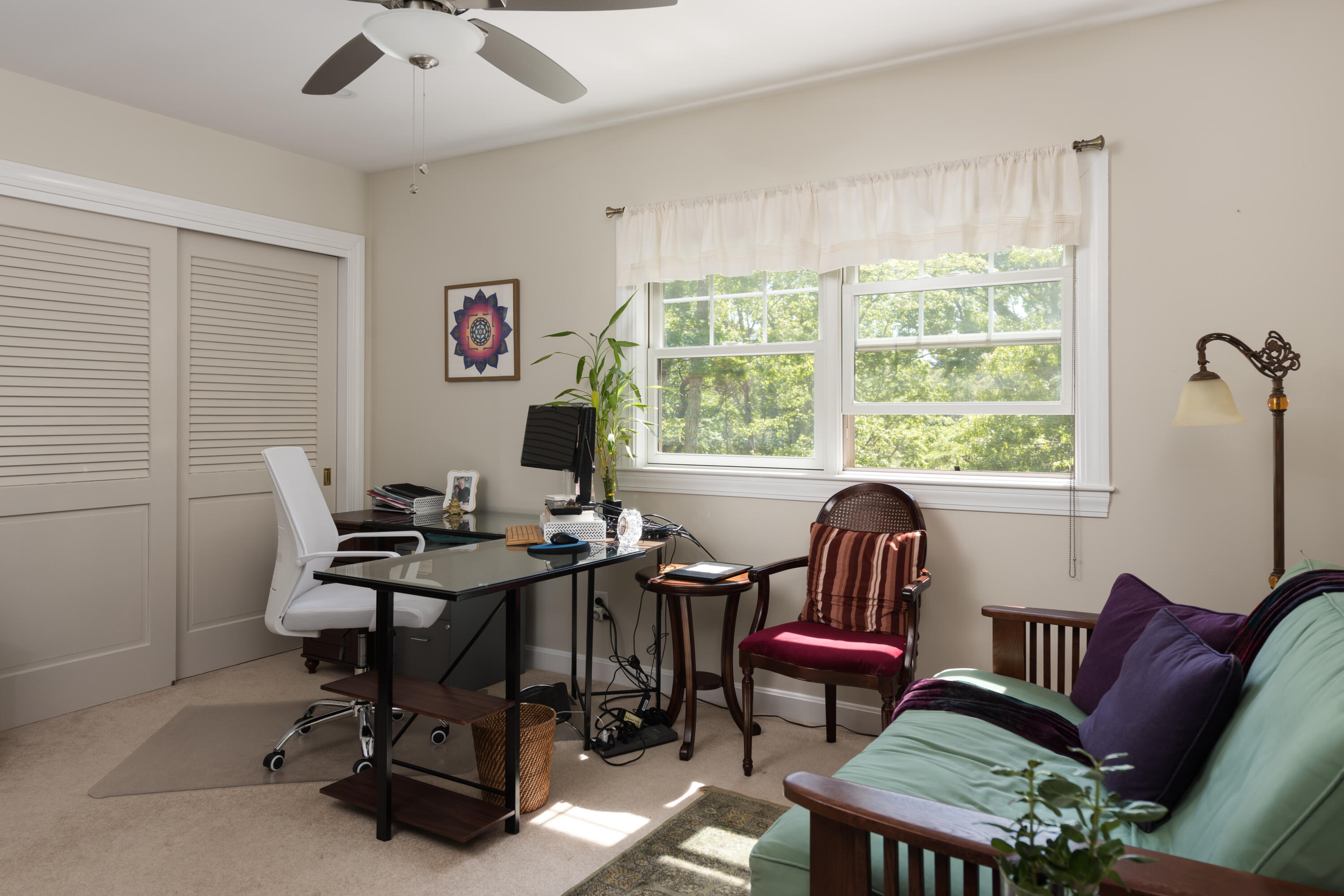 180 Riverview Lane Centerville, MA 02632 - Photo 25 of 55 a view of a workspace with furniture and a window