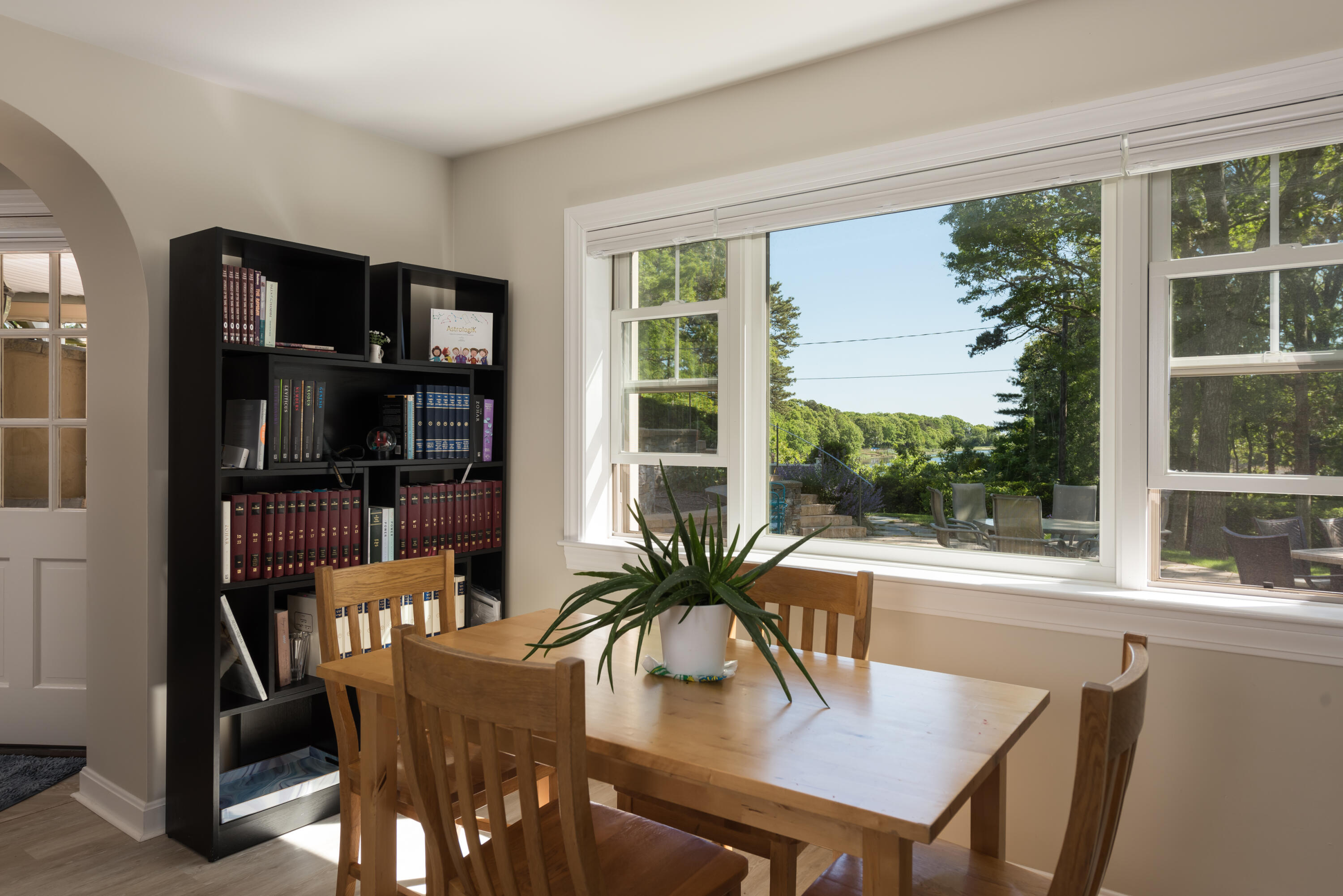 180 Riverview Lane Centerville, MA 02632 - Photo 30 of 55 a view of a dining room with furniture window and outside view