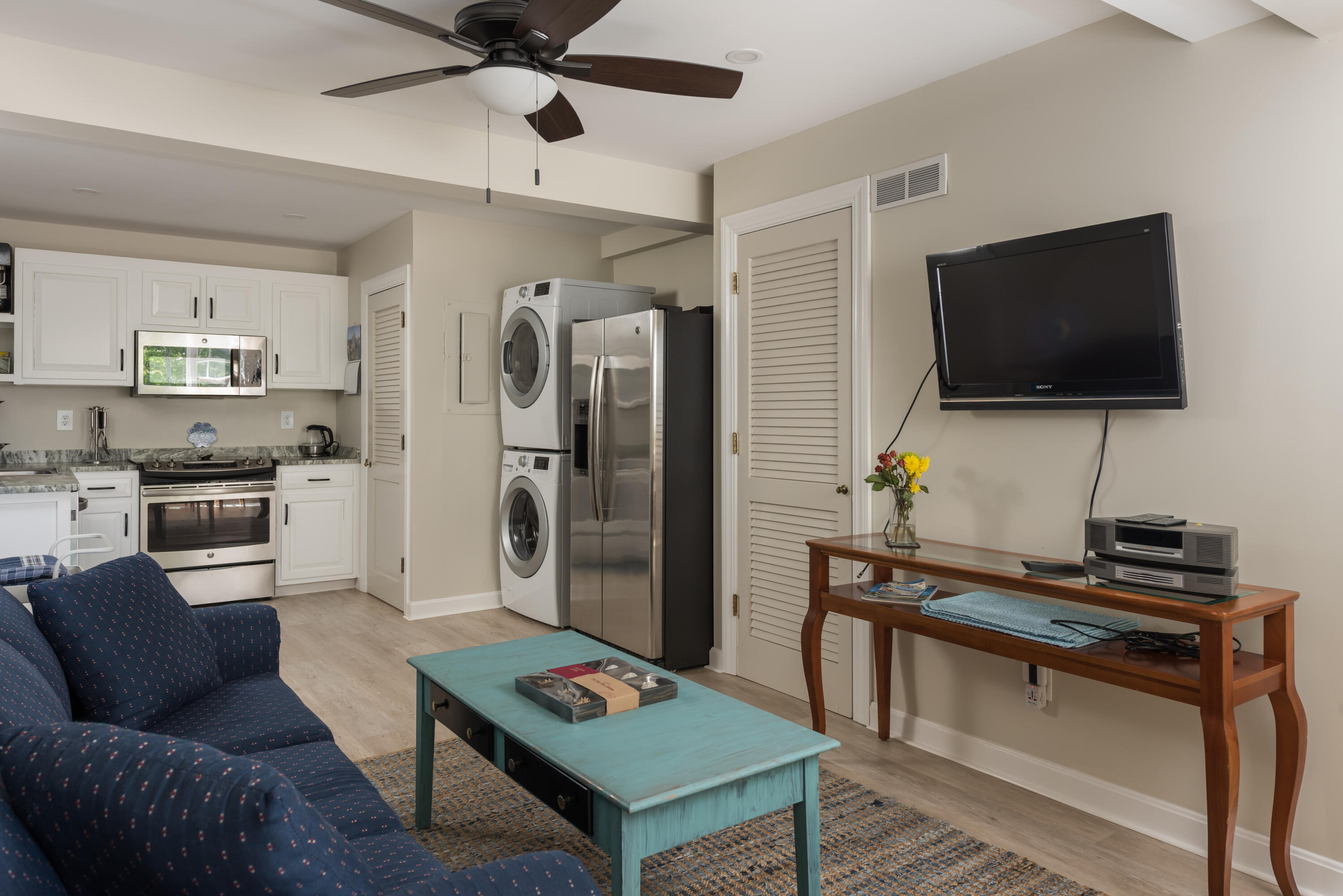 180 Riverview Lane Centerville, MA 02632 - Photo 31 of 55 a living room with furniture and a flat screen tv