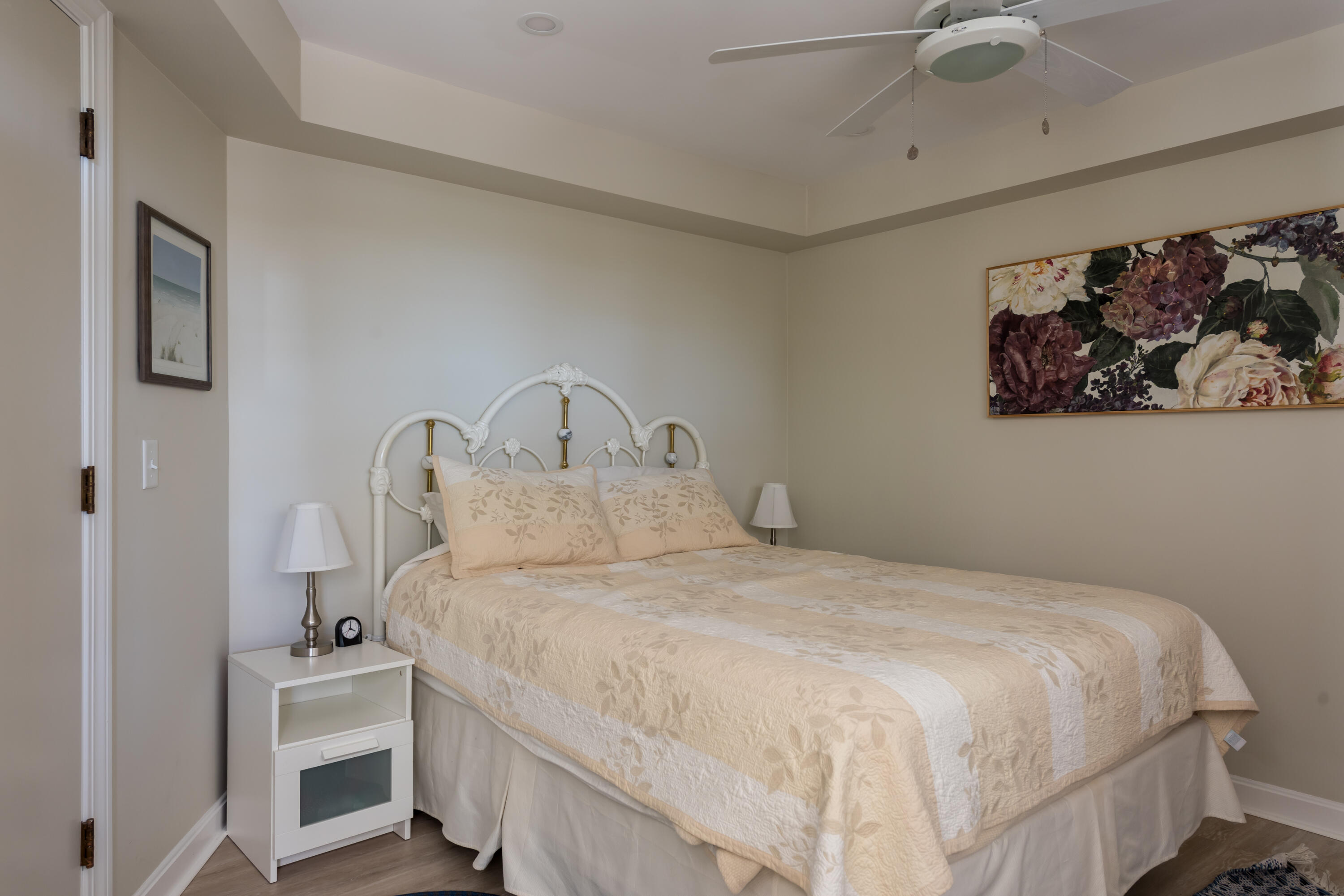 180 Riverview Lane Centerville, MA 02632 - Photo 33 of 55 a bedroom with a bed and cabinets