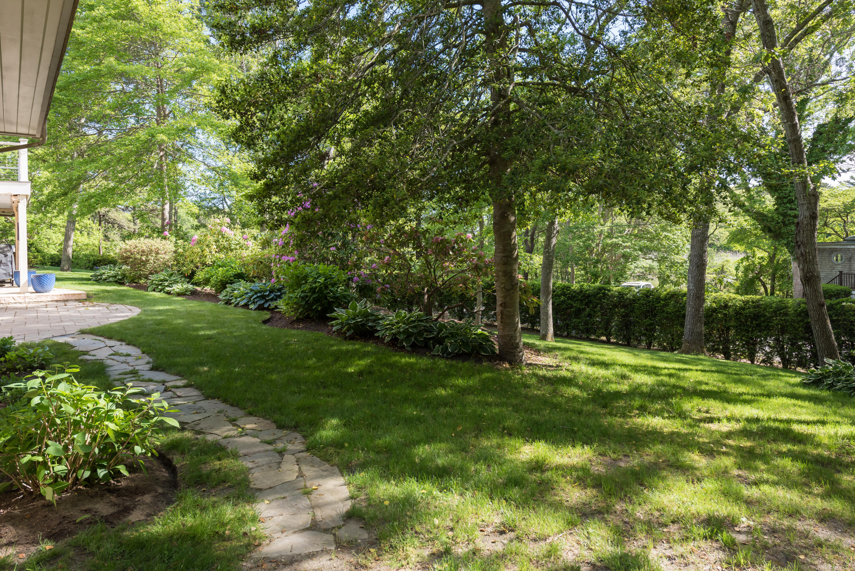 180 Riverview Lane Centerville, MA 02632 - Photo 45 of 55 a view of outdoor space with green field and trees