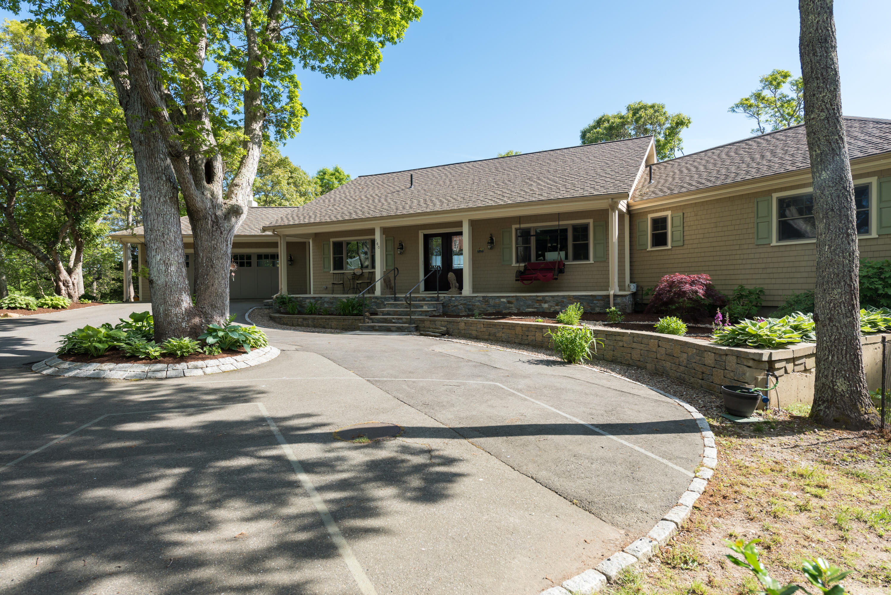 180 Riverview Lane Centerville, MA 02632 - Photo 9 of 55 a house view with a sitting space