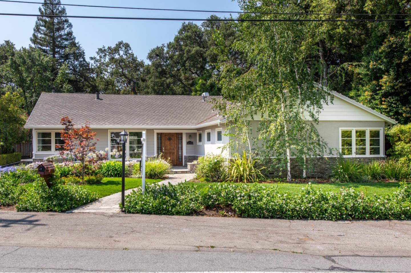 630 Covington Road Los Altos, CA 94024 - Photo 1 of 27 a aerial view of a house with a yard and potted plants