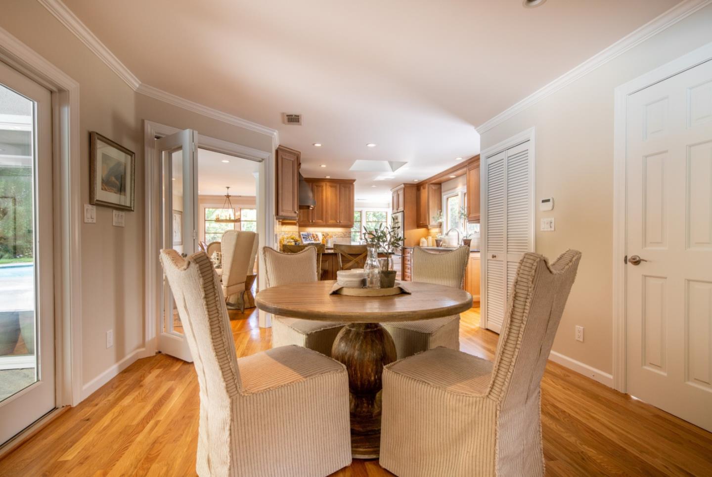 630 Covington Road Los Altos, CA 94024 - Photo 12 of 27 a view of a dining room with furniture and wooden floor