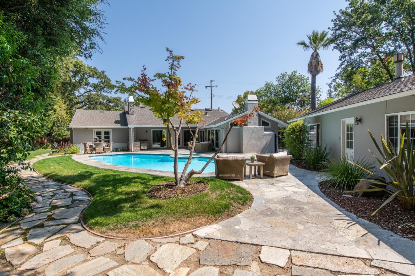630 Covington Road Los Altos, CA 94024 - Photo 26 of 27 a front view of a house with garden