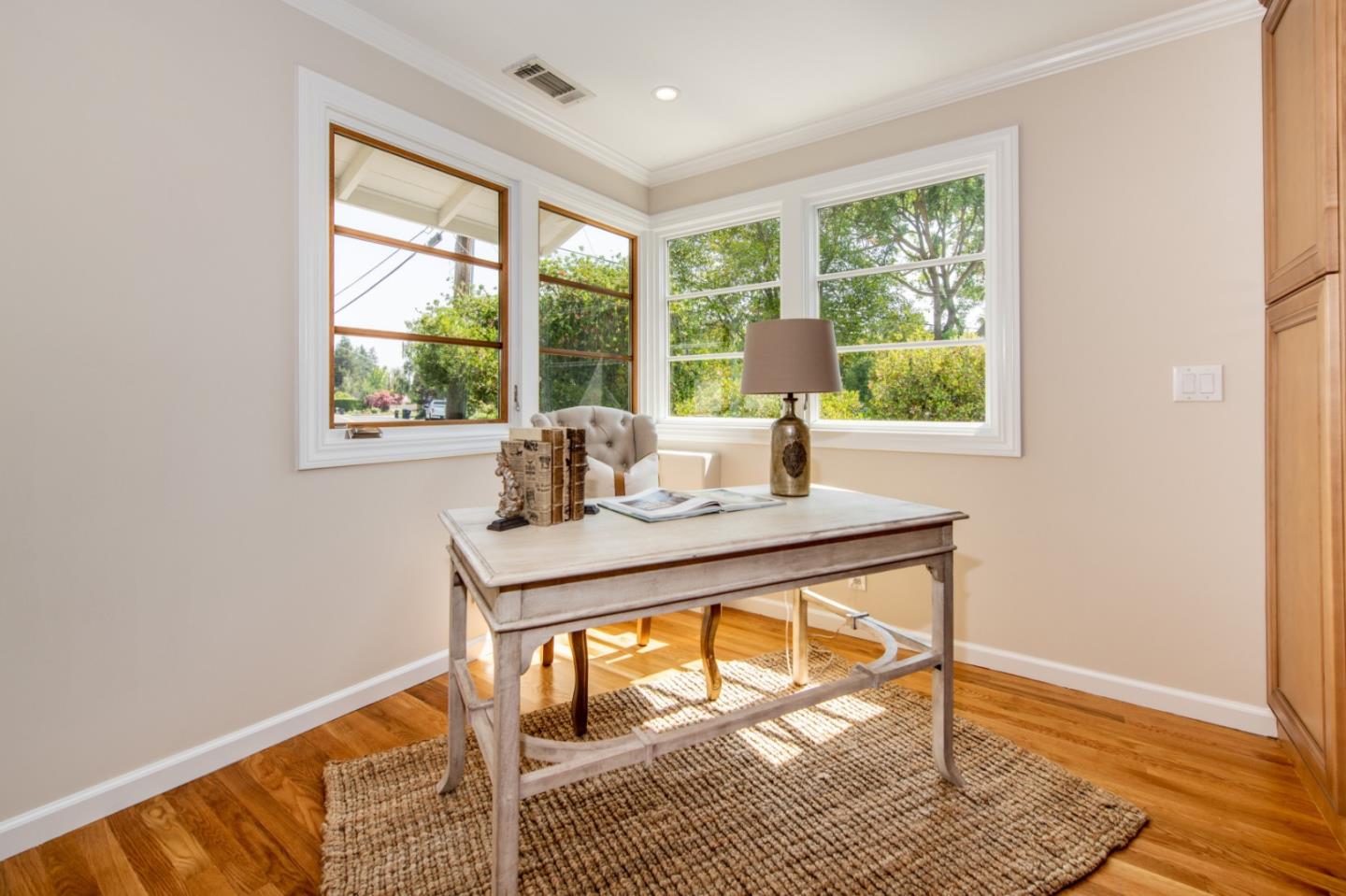 630 Covington Road Los Altos, CA 94024 - Photo 8 of 27 a living room with a table and a window