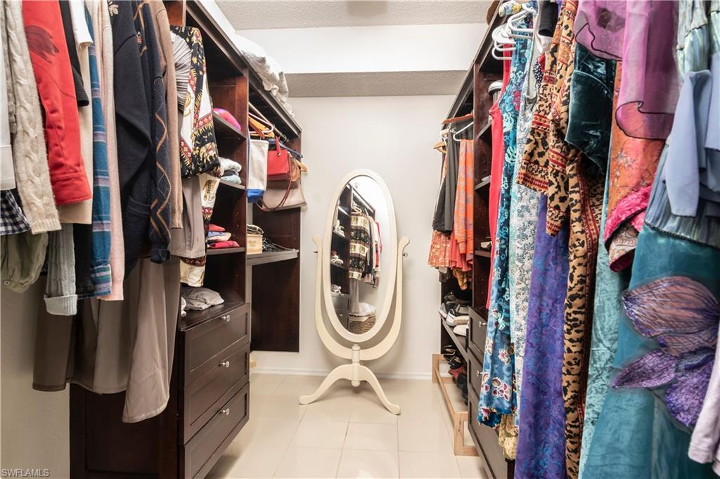 760 Willowbrook Drive, Unit 1202 Naples, FL 34108 - Photo 15 of 28 a utility room with dryer and washer