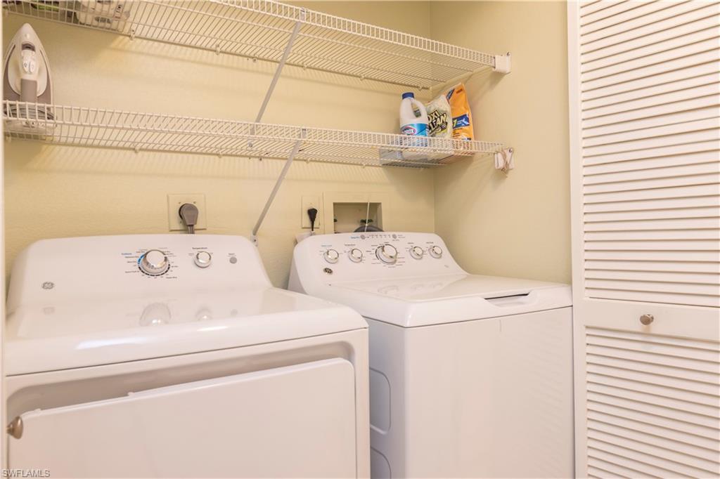 760 Willowbrook Drive, Unit 1202 Naples, FL 34108 - Photo 20 of 28 a utility room with dryer and washer