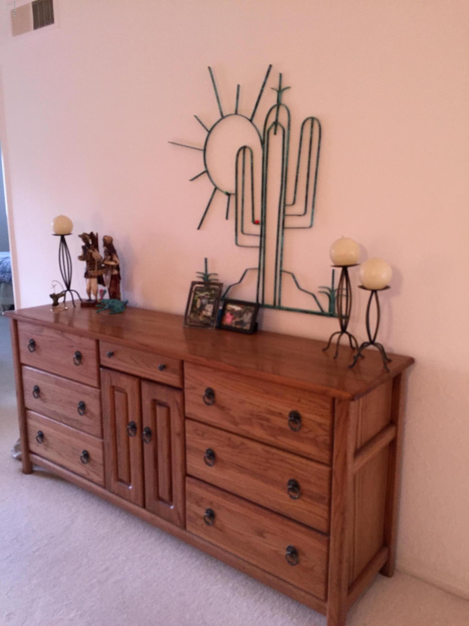 7436 East Chaparral Road, Unit 264B Scottsdale, AZ 85250 - Photo 13 of 27 a bed room with a bed and a dresser