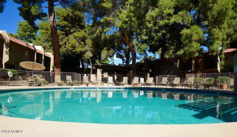 7436 East Chaparral Road, Unit 264B Scottsdale, AZ 85250 - Photo 26 of 27 a view of a house with a yard