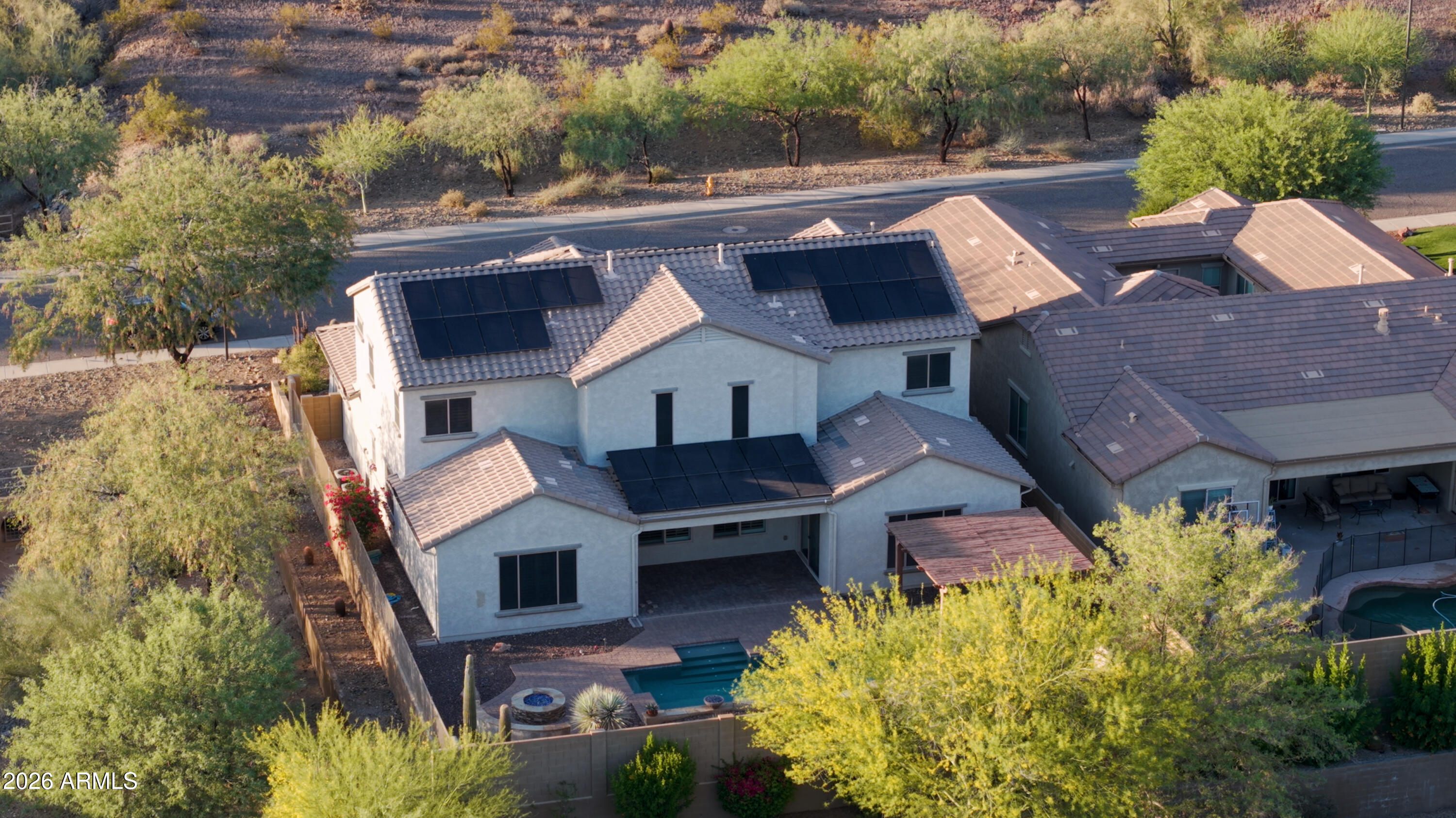 1615 West Red Fox Road Phoenix, AZ 85085 - Photo 62 of 64 an aerial view of a house with a garden
