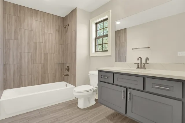 a outdoor space with patio the couches and a dining table with garden view